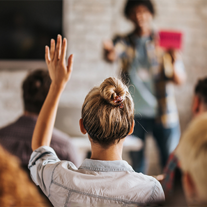 Woman raising hand